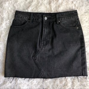 Black denim mini skirt